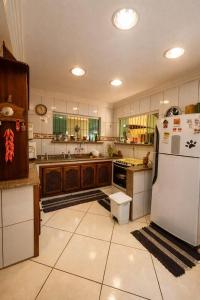 Køkken eller tekøkken på Casa Entre o Mar e a Lagoa