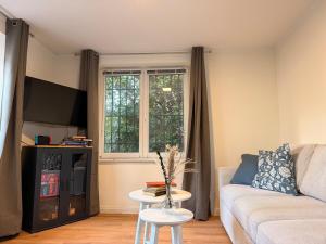 Et tv og/eller underholdning på Royal Blue Residence Elegant, Quiet and Exclusive