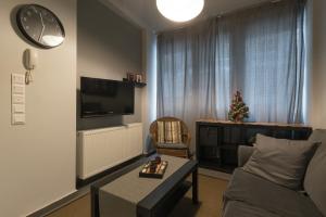 Et tv og/eller underholdning på Annita's Cozy Loft Volos + 7 billeder