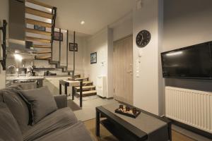 Et opholdsområde på Annita's Cozy Loft Volos