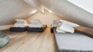 Giường trong phòng chung tại Villavilla #648 - Hasmark Strand, Fyn Og Øer +19 ảnh