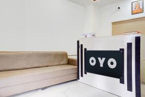 En eller flere senge i et værelse på Hotel O Destination 41