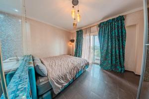 a bedroom with a bed and a window at Marina Agadir Grand Luxury 3 Bedroom Sea view Apartment-familial in Agadir +84 photos
