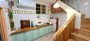 Kuchyň nebo kuchyňský kout v ubytování 沐時光民宿 + 12 fotografií