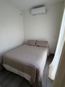 Postel nebo postele na pokoji v ubytování Chacras Coria Posada 1460