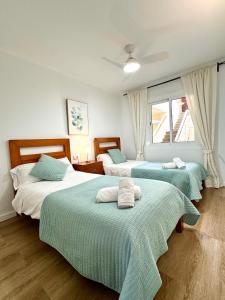 En eller flere senge i et værelse på Albers Apartment