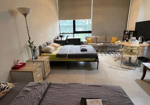 Postel nebo postele na pokoji v ubytování Lumi Tropicana - Unique Stays ! + 44 fotografií