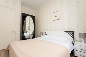 En eller flere senge i et værelse på The Tbilisi Crest