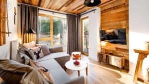 Et opholdsområde på Apartamenty Good Time- Centrum, blisko wyciągu i szlaków