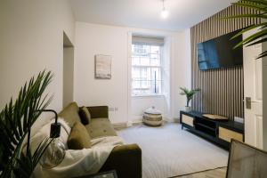 Et tv og/eller underholdning på Sun Street Retreats