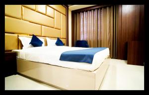 En eller flere senge i et værelse på The Mid Inn