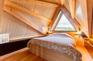 Postel nebo postele na pokoji v ubytování Le Tipi des Arnats