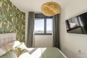 Et tv og/eller underholdning på Living4Malaga Tower Horizon