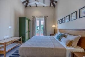 Ένα ή περισσότερα κρεβάτια σε δωμάτιο στο Cygnus by Elivaas +48 φωτογραφίες