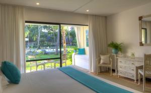 Postel nebo postele na pokoji v ubytování Diamonds Malindi