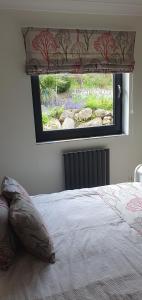 Postel nebo postele na pokoji v ubytování Carrick Chalets - 1 + 10 fotografií