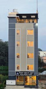 a large building with windows on the side of it at Hotel Airport Transit in Bengaluru