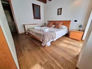 Postel nebo postele na pokoji v ubytování Grace Apartment