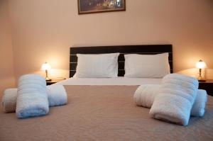 Stratigato Garden Getaway near Chios Town tesisinde bir odada yatak veya yataklar