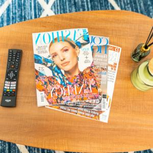 a table with a magazine and a remote control at Modern Two Bed Apartment - Sleeps 3 - Parking - Netflix 50C in Netherton +18 photos