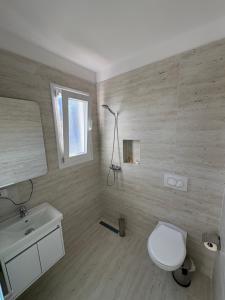 Vannituba majutusasutuses Hotel Skura