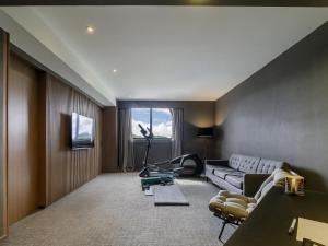 TV a/nebo společenská místnost v ubytování Pullman Sao Paulo Guarulhos Airport