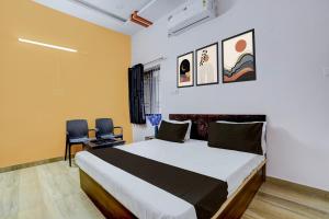 Ένα ή περισσότερα κρεβάτια σε δωμάτιο στο Hotel O by OYO Platinum