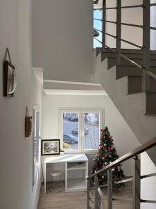 Televiisor ja/või meelelahutuskeskus majutusasutuses Hotel Skura