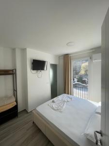 Voodi või voodid majutusasutuse Hotel Skura toas +6 fotot