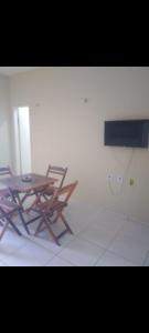 TV a/nebo společenská místnost v ubytování Terraço Muniz