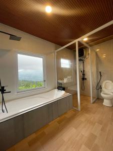 Koupelna v ubytování pojok kahyangan homestay and cabin