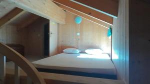 Postel nebo postele na pokoji v ubytování Chalet Les Epilobes, Zinal