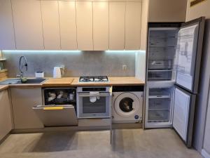 Kuchyň nebo kuchyňský kout v ubytování Widok na stawy