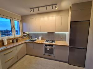 Kuchyň nebo kuchyňský kout v ubytování Widok na stawy