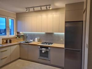 Kuchyň nebo kuchyňský kout v ubytování Widok na stawy