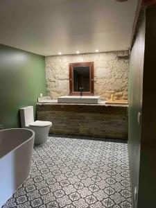 Et badeværelse på Charmante maison avec jardin à Marsac - 50 m²