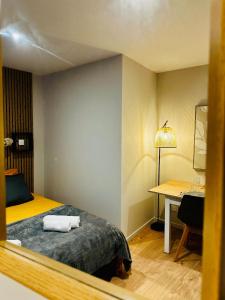 En eller flere senge i et værelse på L'Ecrin du Mallarmé - WiFi - Neuf