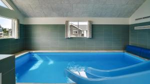 Swimmingpoolen hos eller tæt på Villavilla #461 - Houstrup Strand, Vestjylland