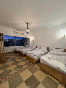 Postel nebo postele na pokoji v ubytování Antika Hotel