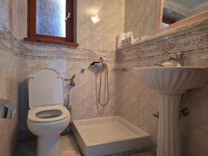 Koupelna v ubytování Casa Capsia + 11 fotografií