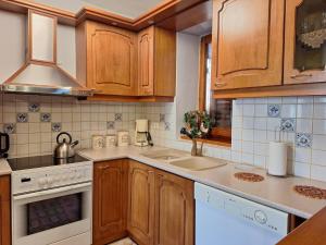 Kuchyň nebo kuchyňský kout v ubytování Casa Capsia