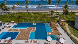 Bazén v ubytování Pé na Areia com conforto | Vog Marine Ilhéus nebo v jeho okolí