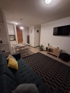 TV a/nebo společenská místnost v ubytování Depto 2 Dorm 1 Baño Distrito Verde La Serena