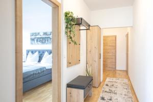 a bedroom with a bed and a window at Murleben Appartements - Nahe Red Bull Ring & Kreischberg in Stadl an der Mur
