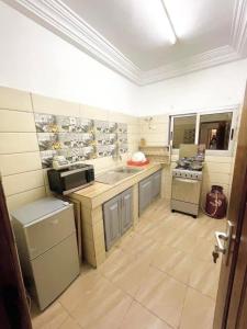 Køkken eller tekøkken på Appartement meublé