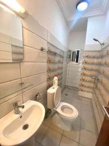 Et badeværelse på Appartement meublé