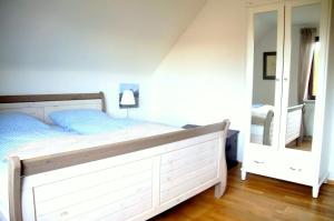 En eller flere senge i et værelse på Comfort Palace