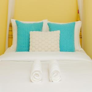 En eller flere senge i et værelse på Afrivie Homes 1-Bedroom Apartments in Kisii Town