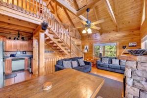 a large living room with a wooden ceiling at High Cotton Epic Views Hot Tub Pool Table in Sevierville