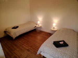 Postel nebo postele na pokoji v ubytování L'ESCAPADE T3 avec terrasse privative